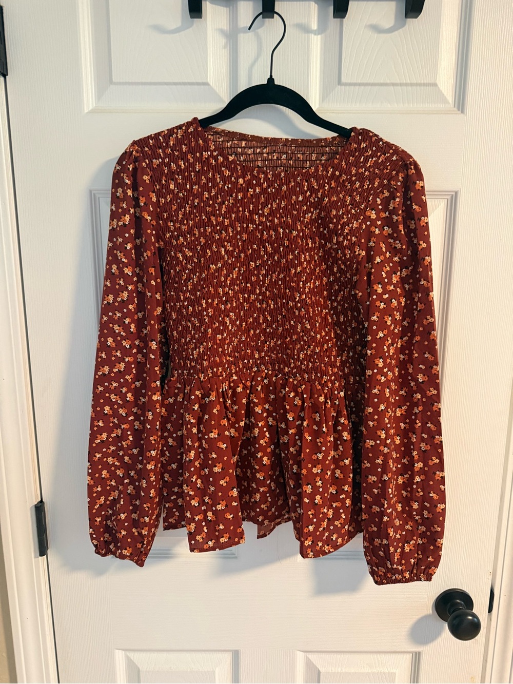 Smocked Floral Peplum Blouse in Rust